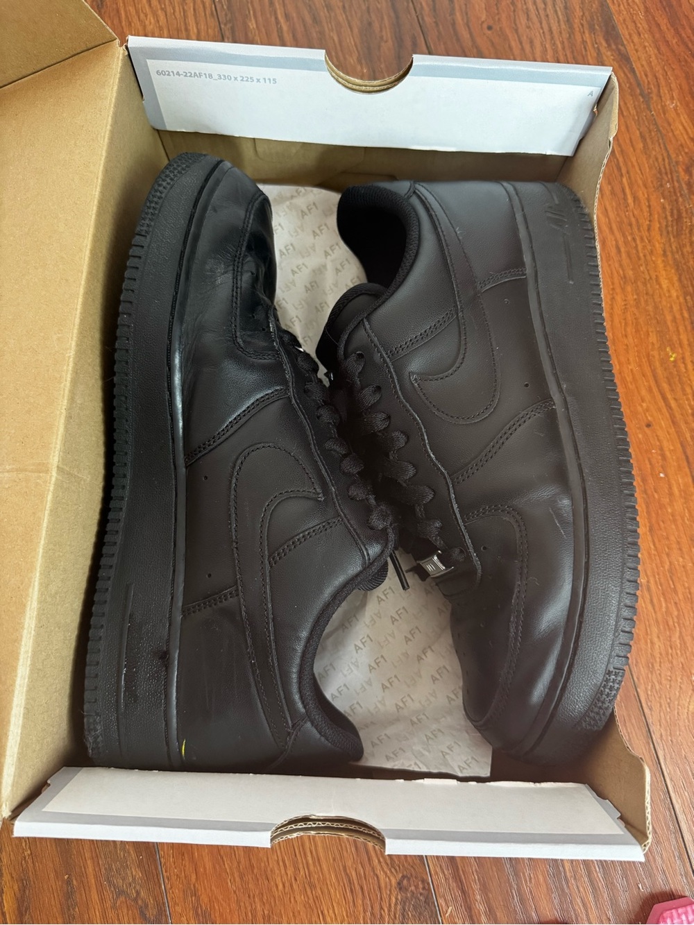 Nike All-Black Leather Athletic Sneakers